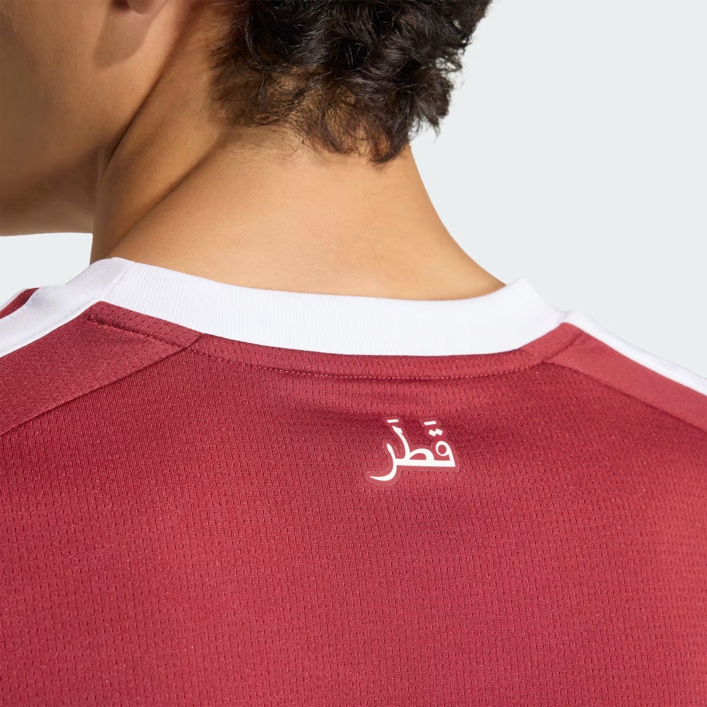 Camisa Catar 2026/27 I - etiqueta
