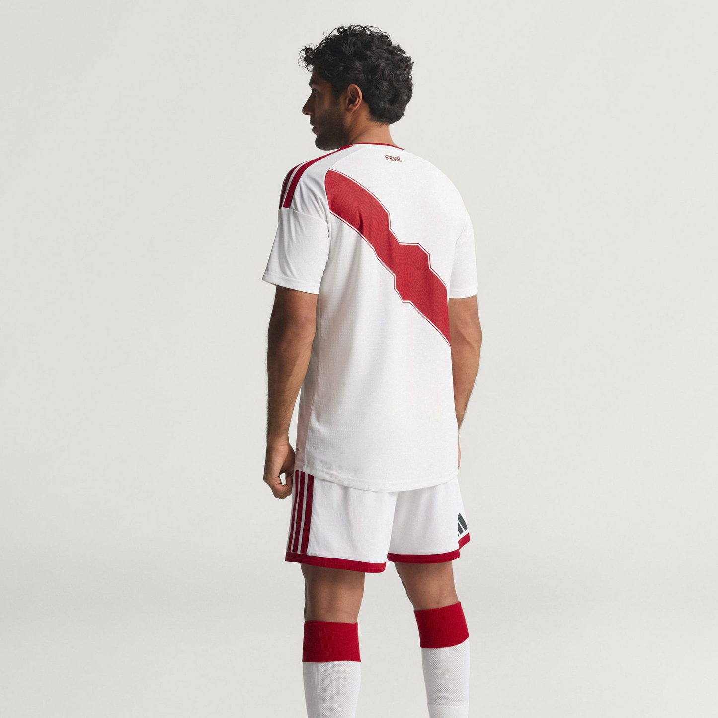 Camisa Peru 2026/27 I Jogador - detalhe da manga